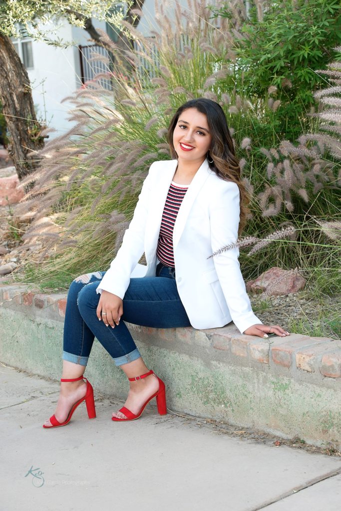 senior girl with blazer and red shoes